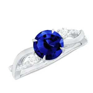 2 CT Created Blue Sapphire and Diamond Engagement Ring with Crossover Shank