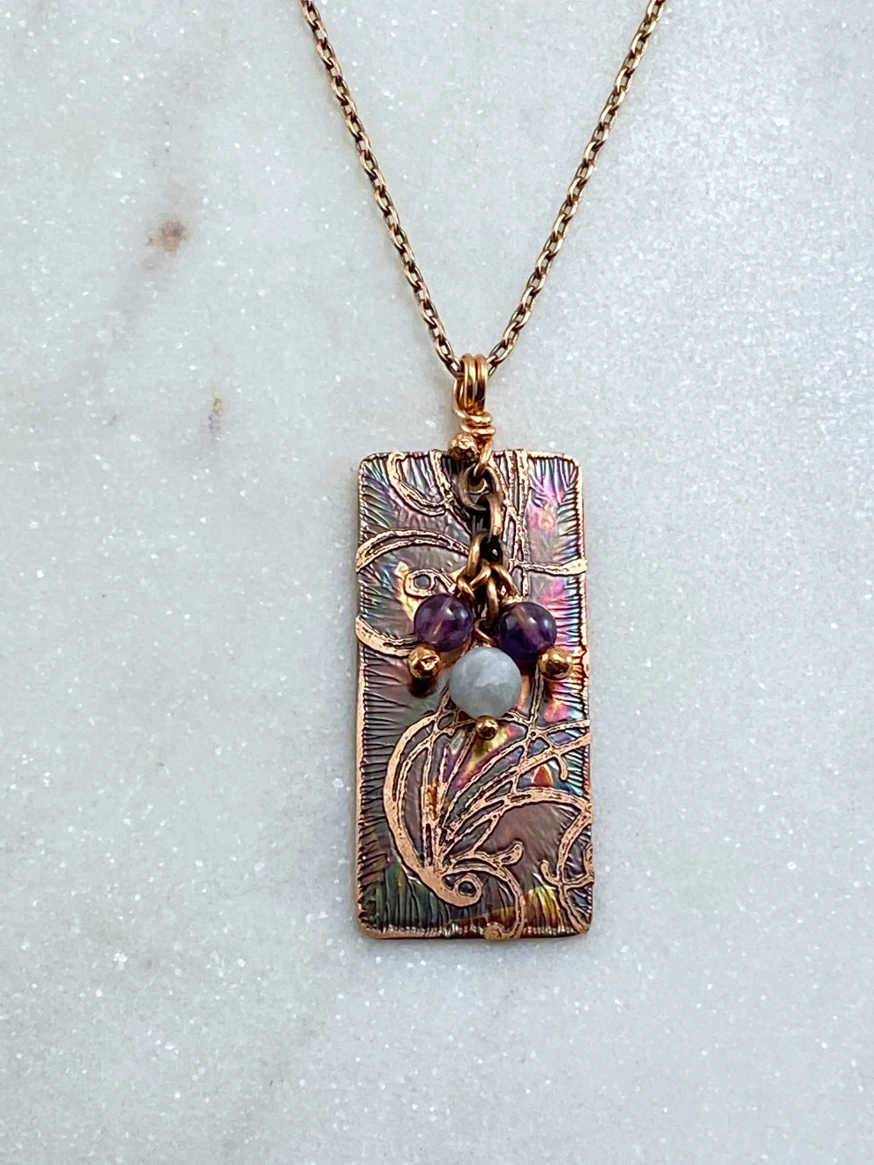 Acid etched copper swirl necklace with amethyst and moonstone