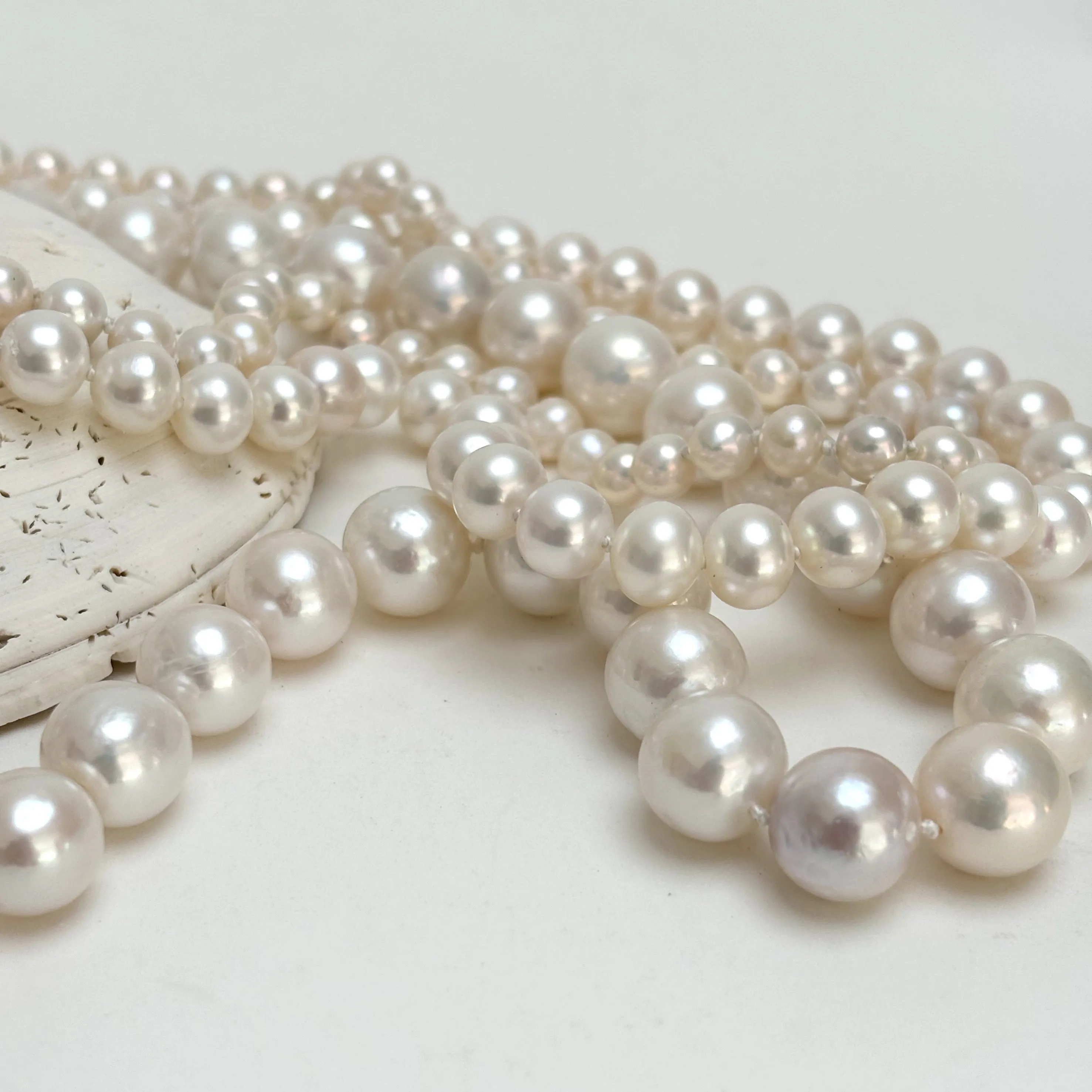 always classy three strand pearl necklace with vintage clasp