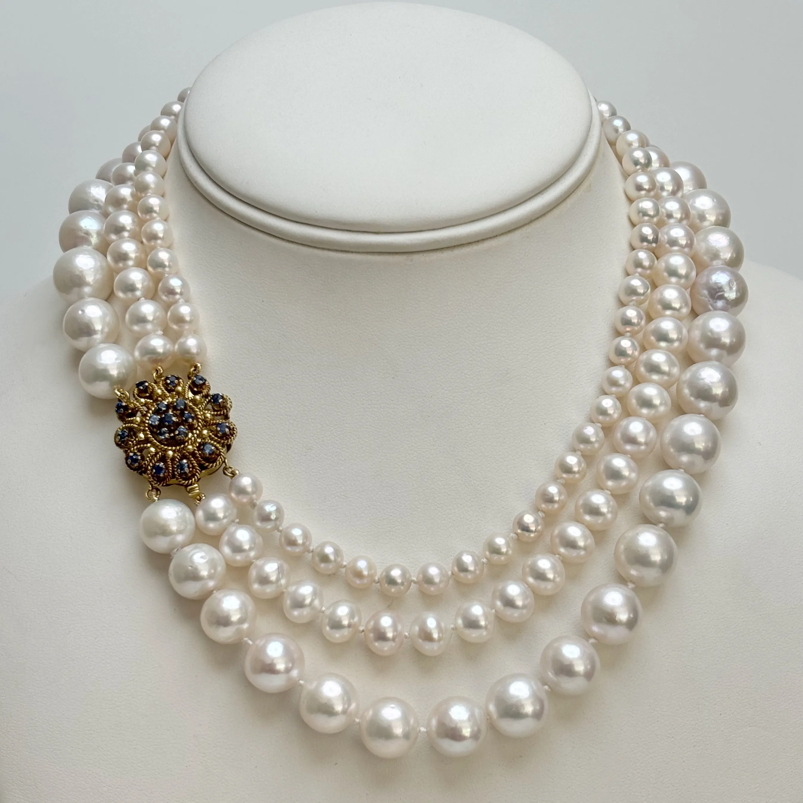 always classy three strand pearl necklace with vintage clasp