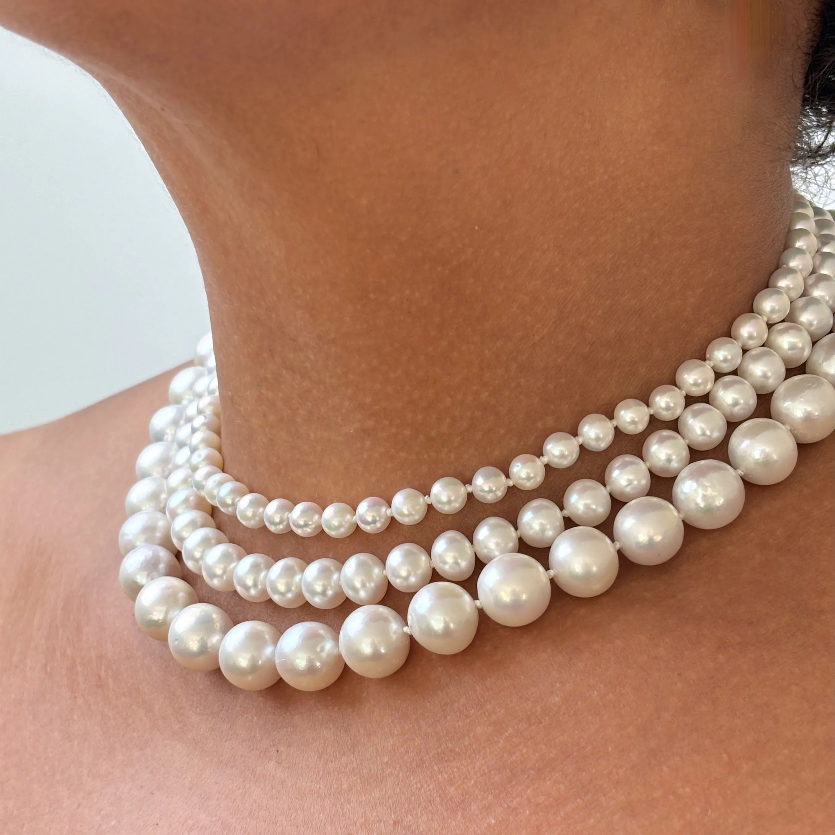 always classy three strand pearl necklace with vintage clasp