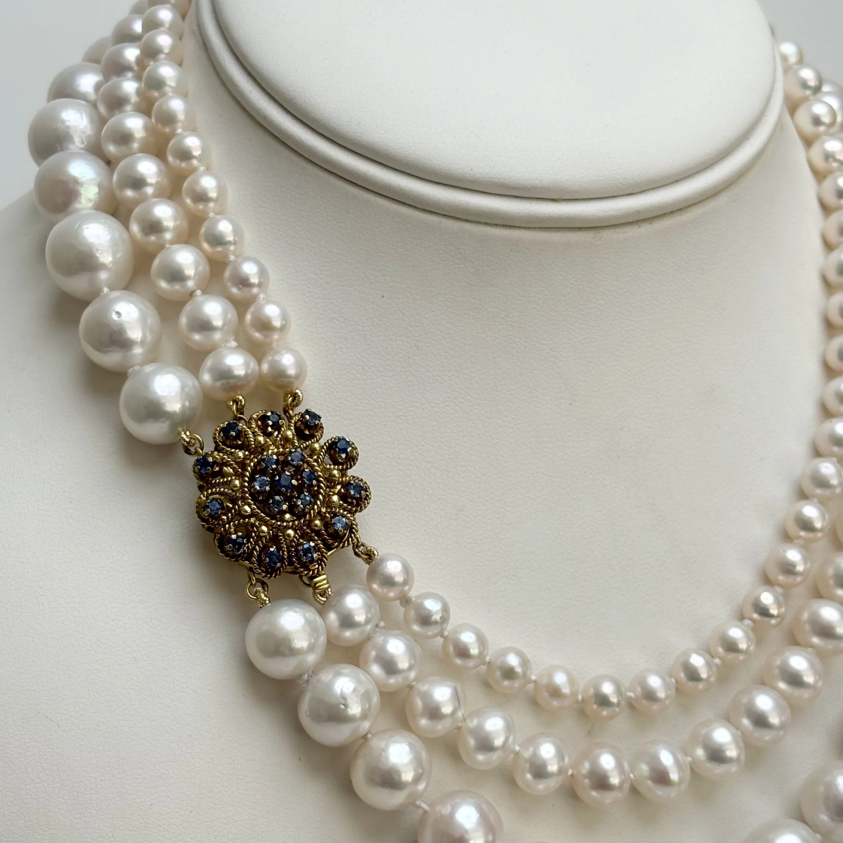 always classy three strand pearl necklace with vintage clasp