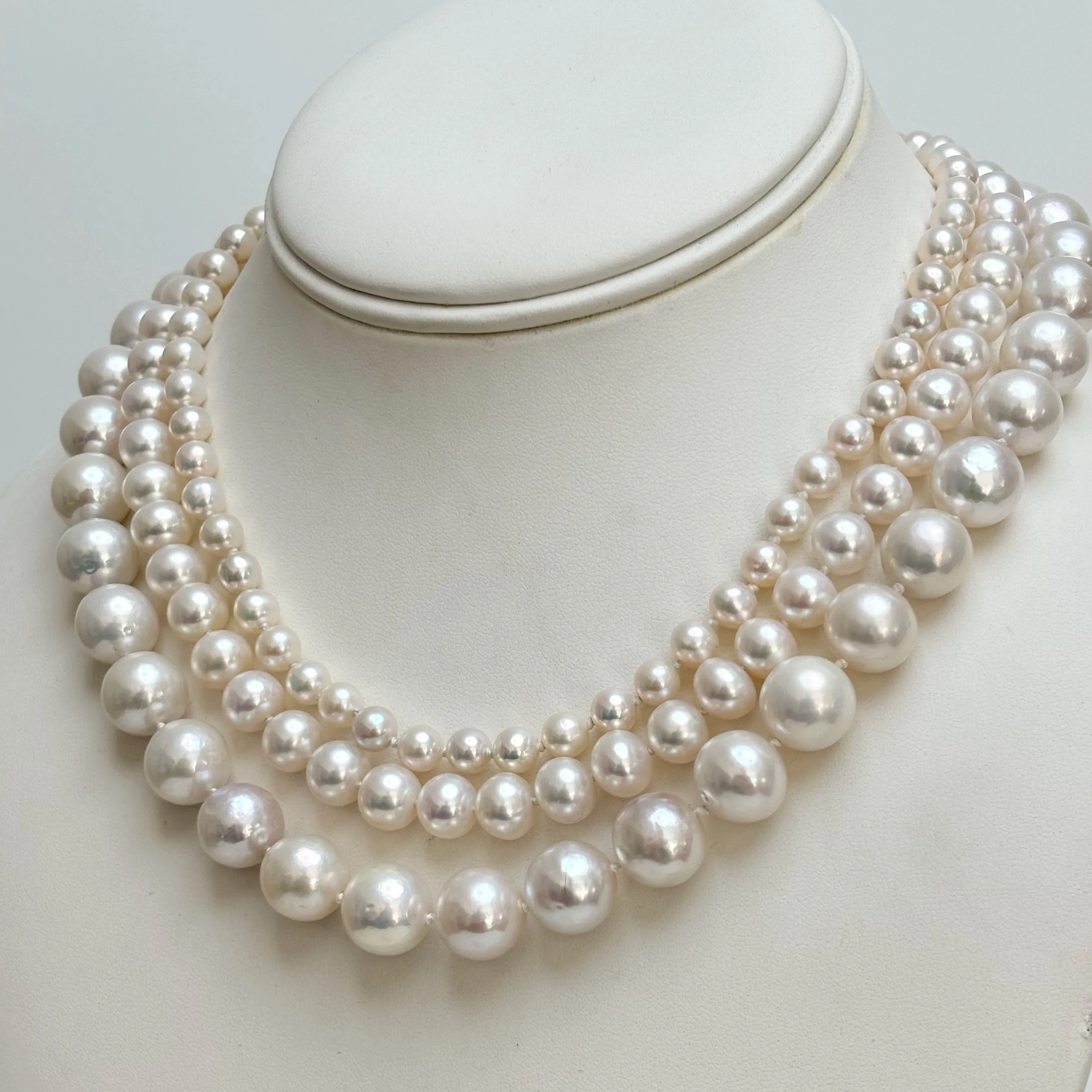 always classy three strand pearl necklace with vintage clasp