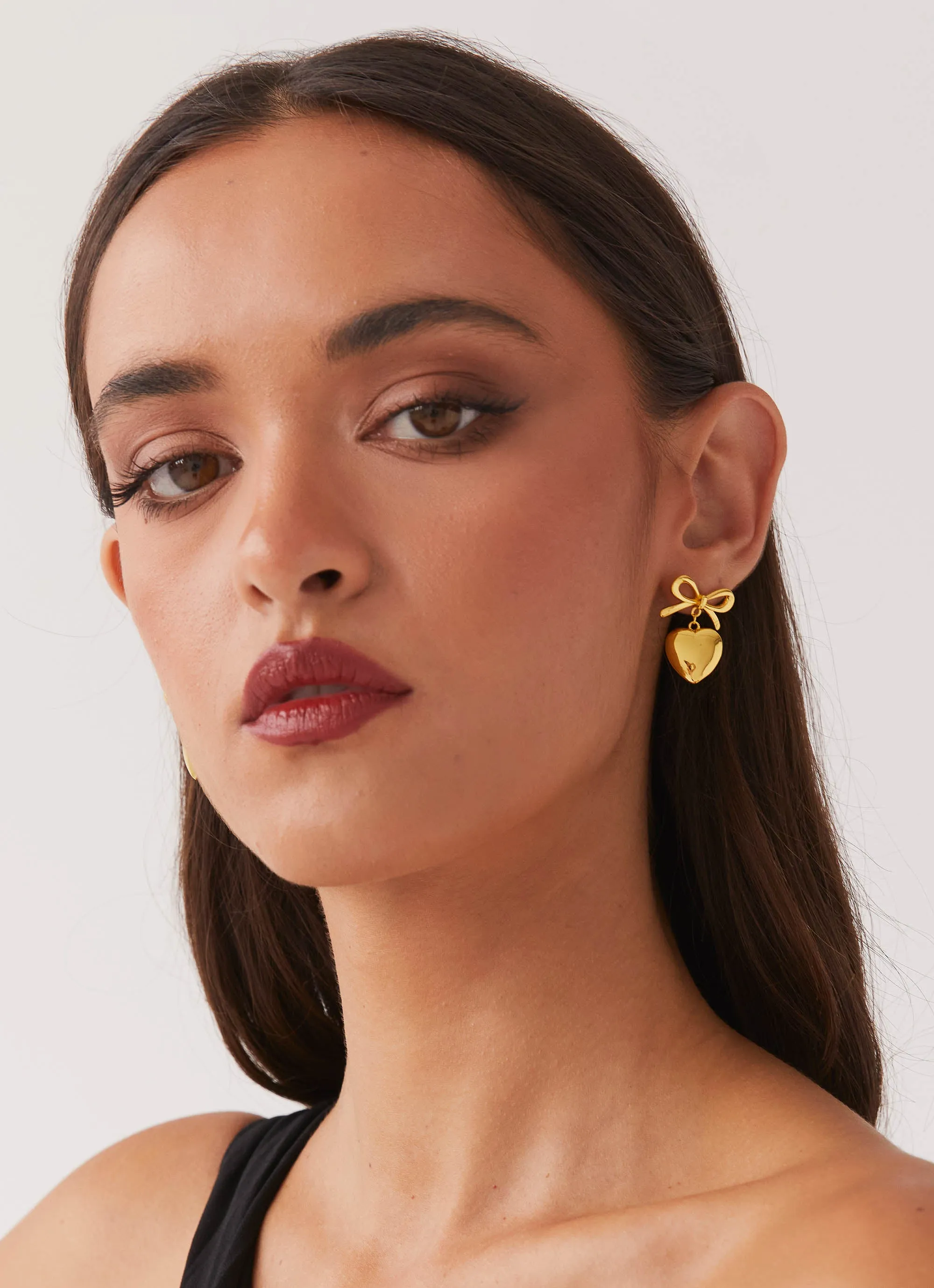 Chasity Bow And Heart Earrings - Gold