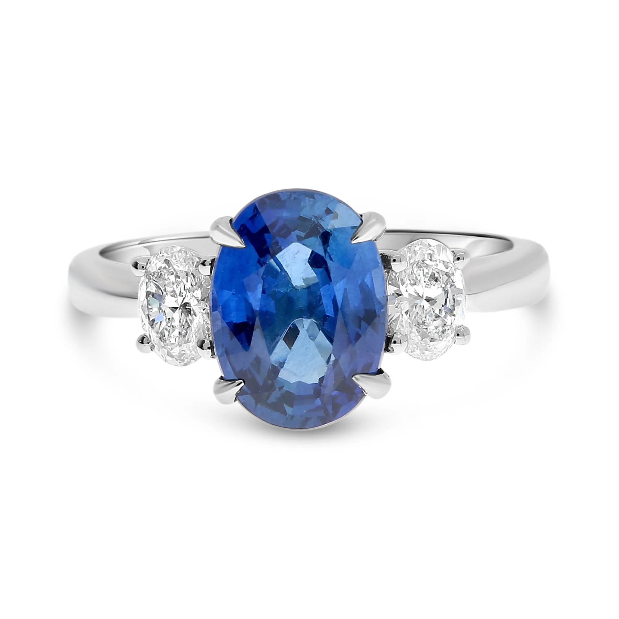 Oval Blue Sapphire and Diamond Three Stone Platinum Ring