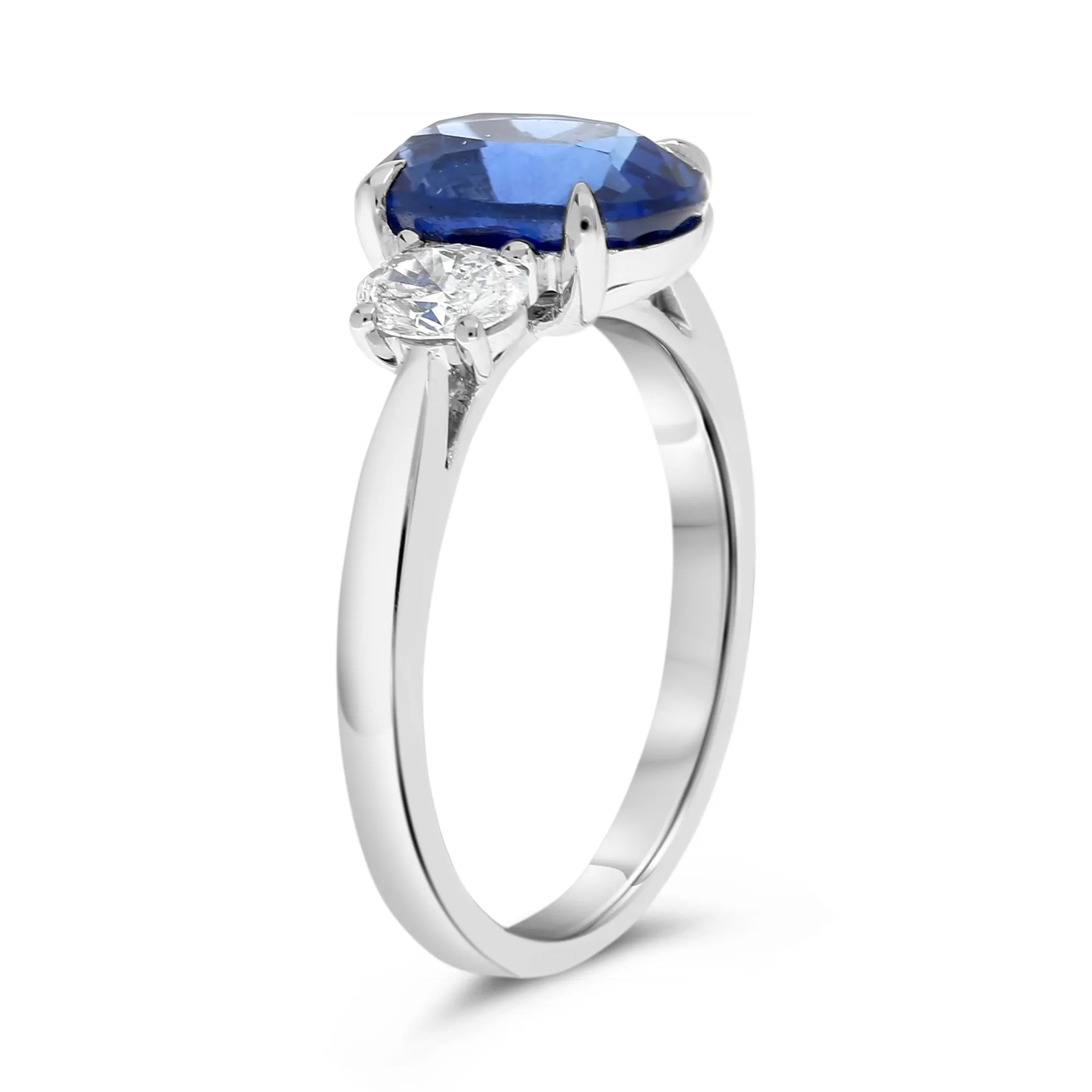 Oval Blue Sapphire and Diamond Three Stone Platinum Ring