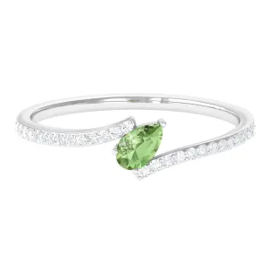 Tilted Pear Shape Green Sapphire and Diamond Bypass Promise Ring